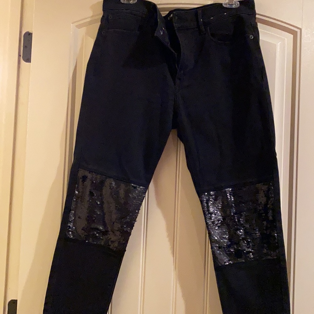 Express jeans with sequin knee.